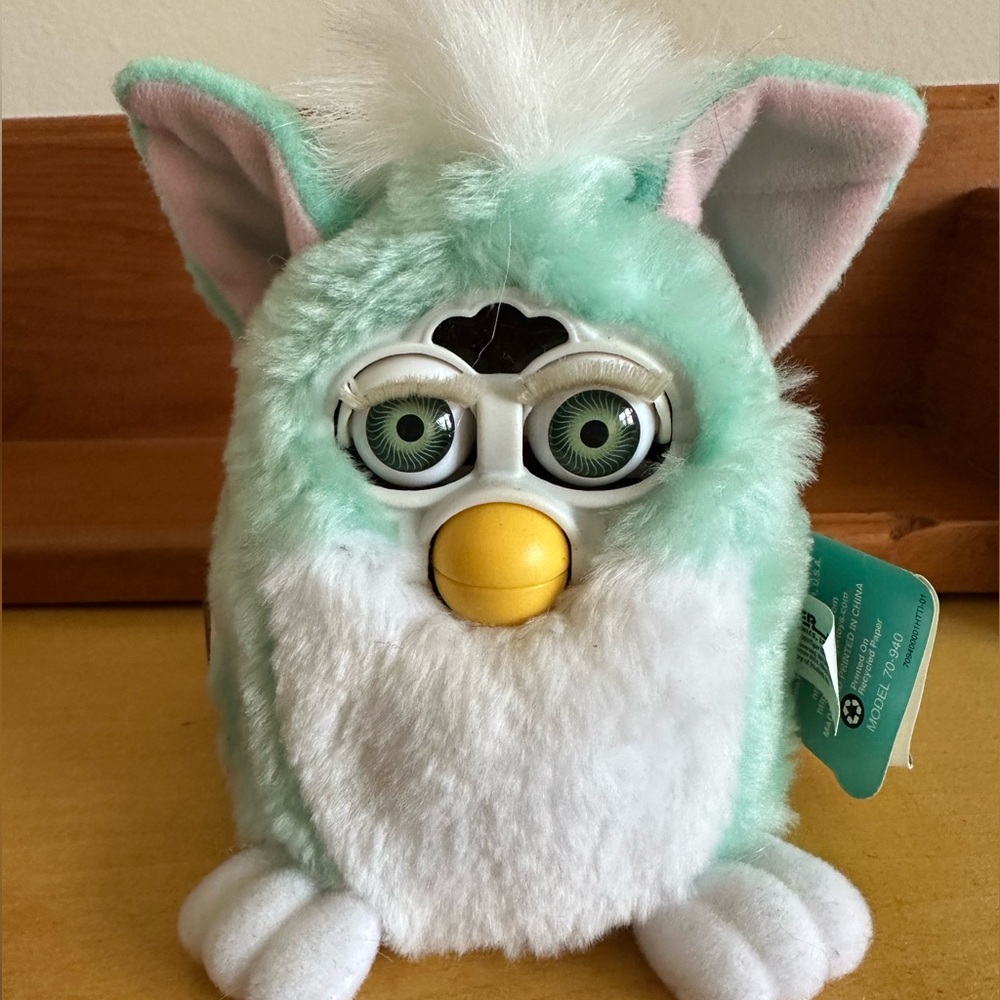 Minty green baby furby with tags